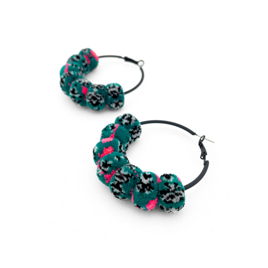 pom'd painted hoops in techno teal