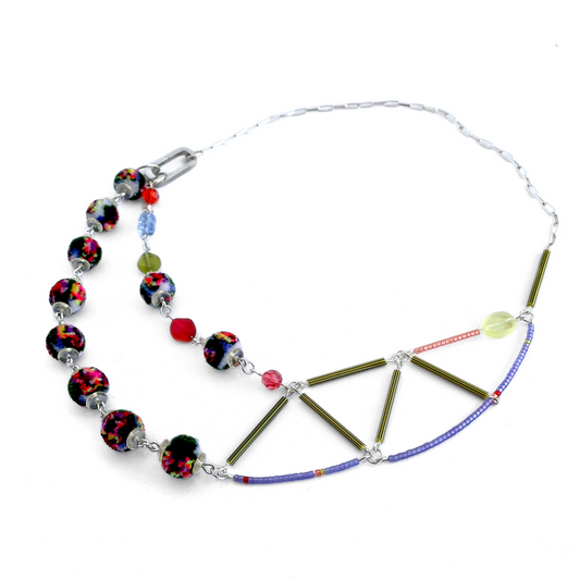 charm'd necklace in garden party