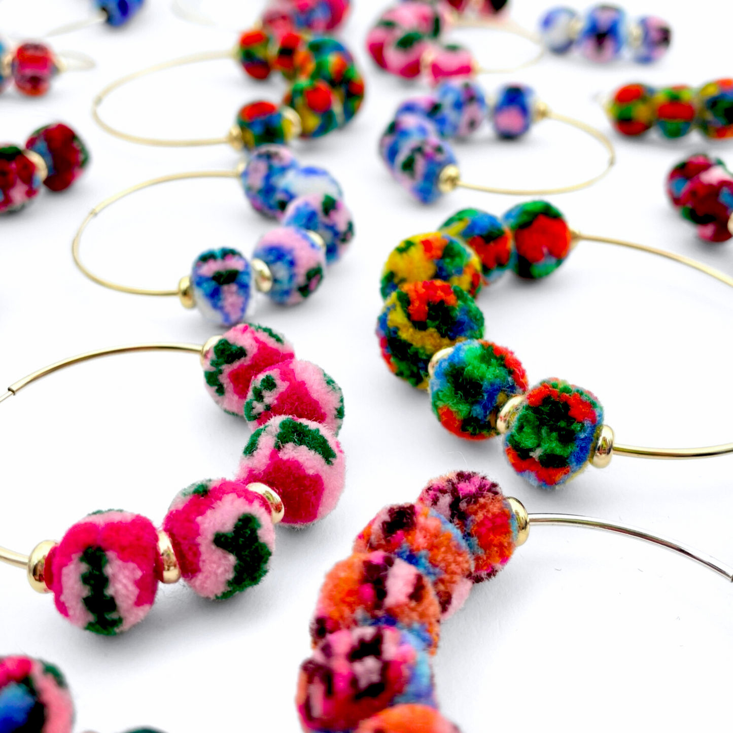 pom'd silver hoops in garnet