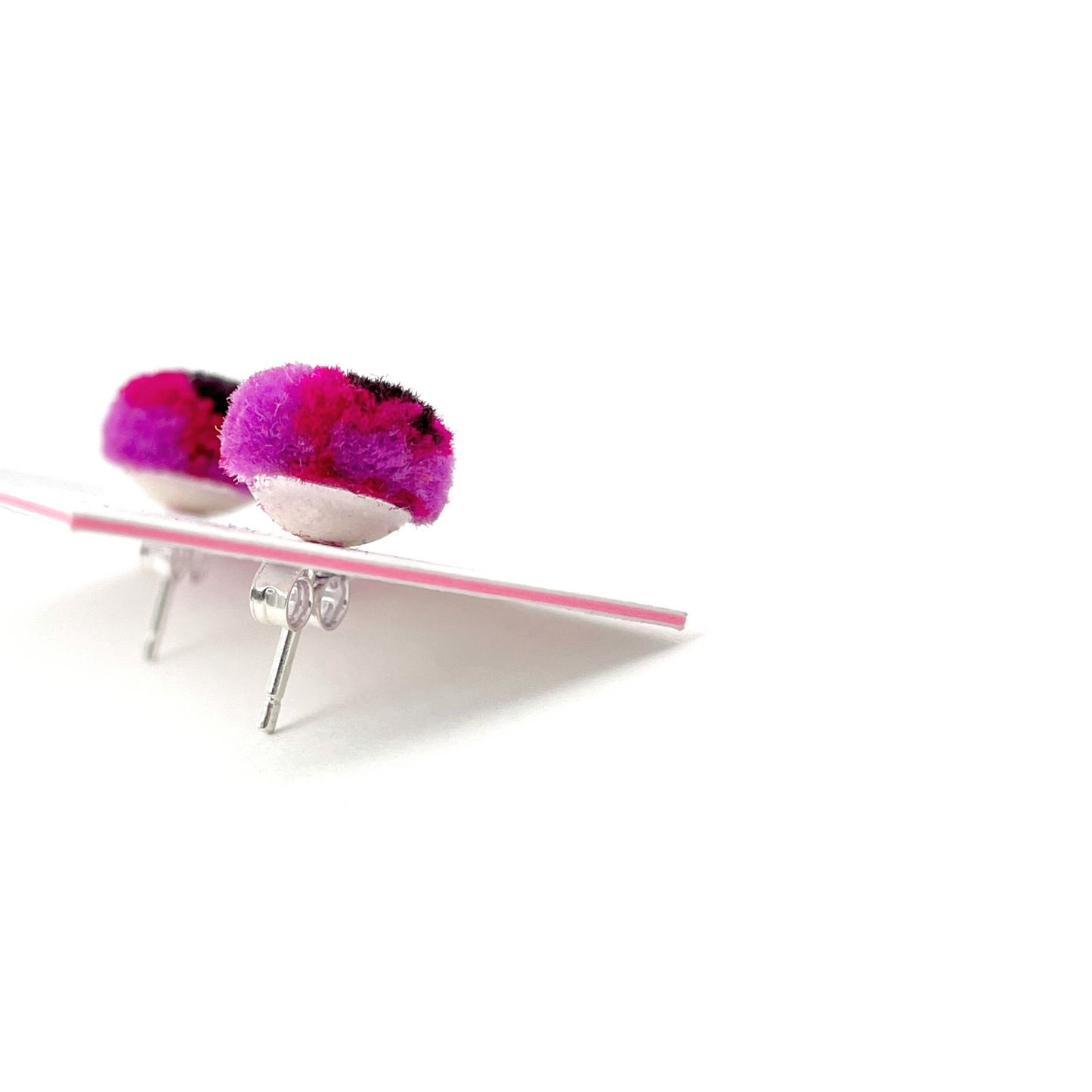pom'd silver studs in magenta