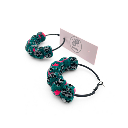 pom'd painted hoops in techno teal