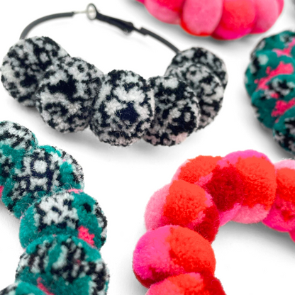 pom'd painted hoops in techno teal