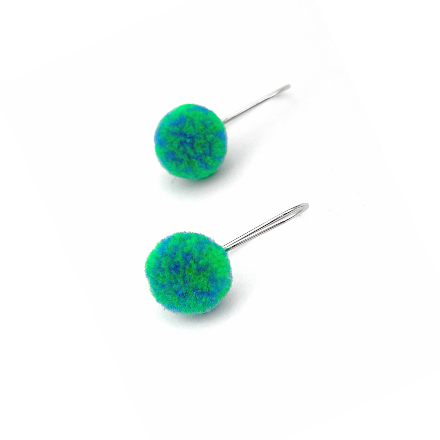 pom'd silver teardrops in globe