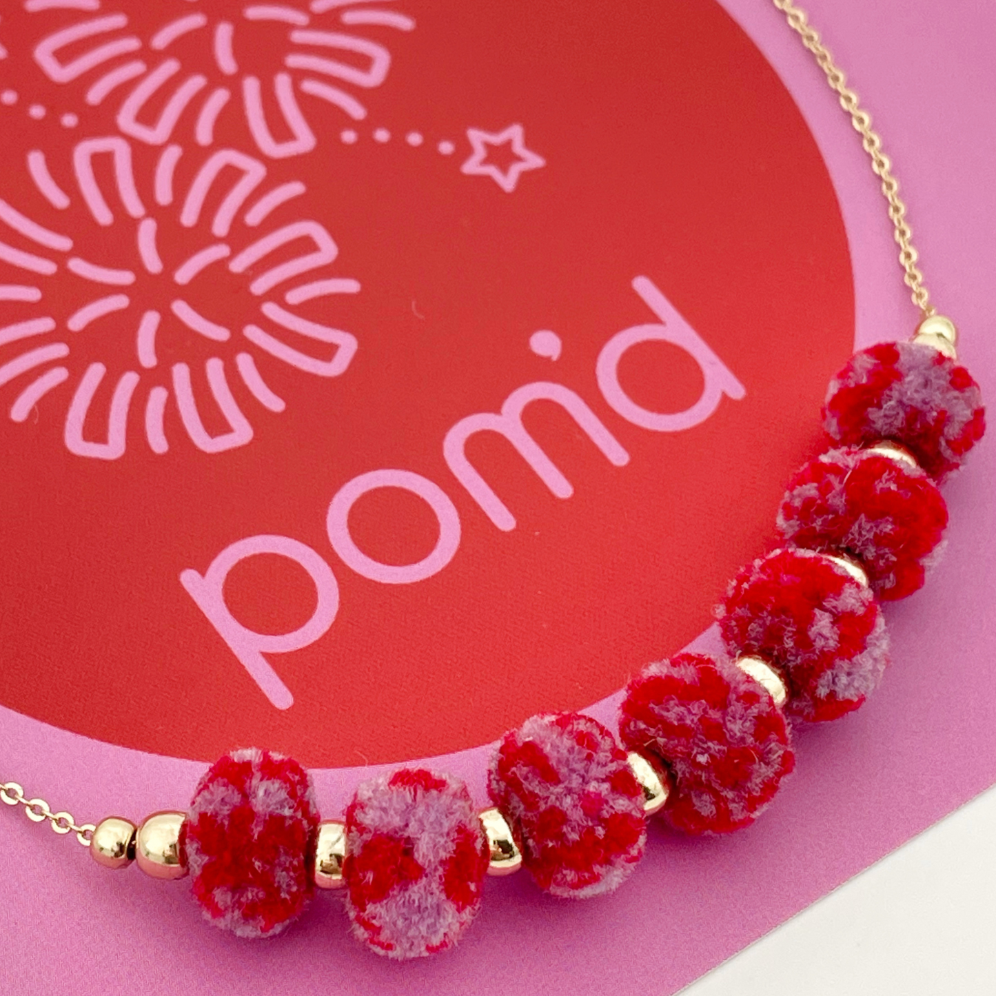 pom'd necklace in cranberry