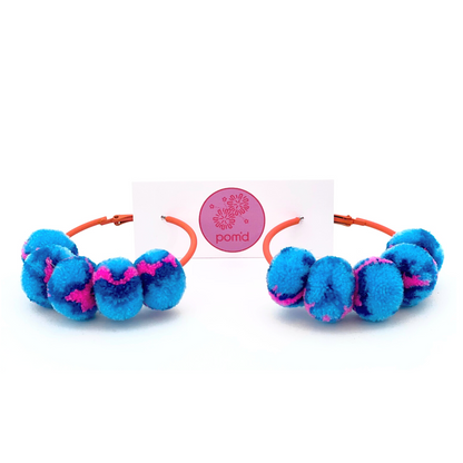 pom'd painted hoops in electric