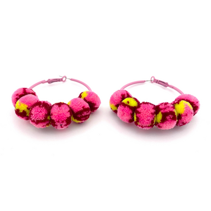 pom'd painted hoops in pink lemonade