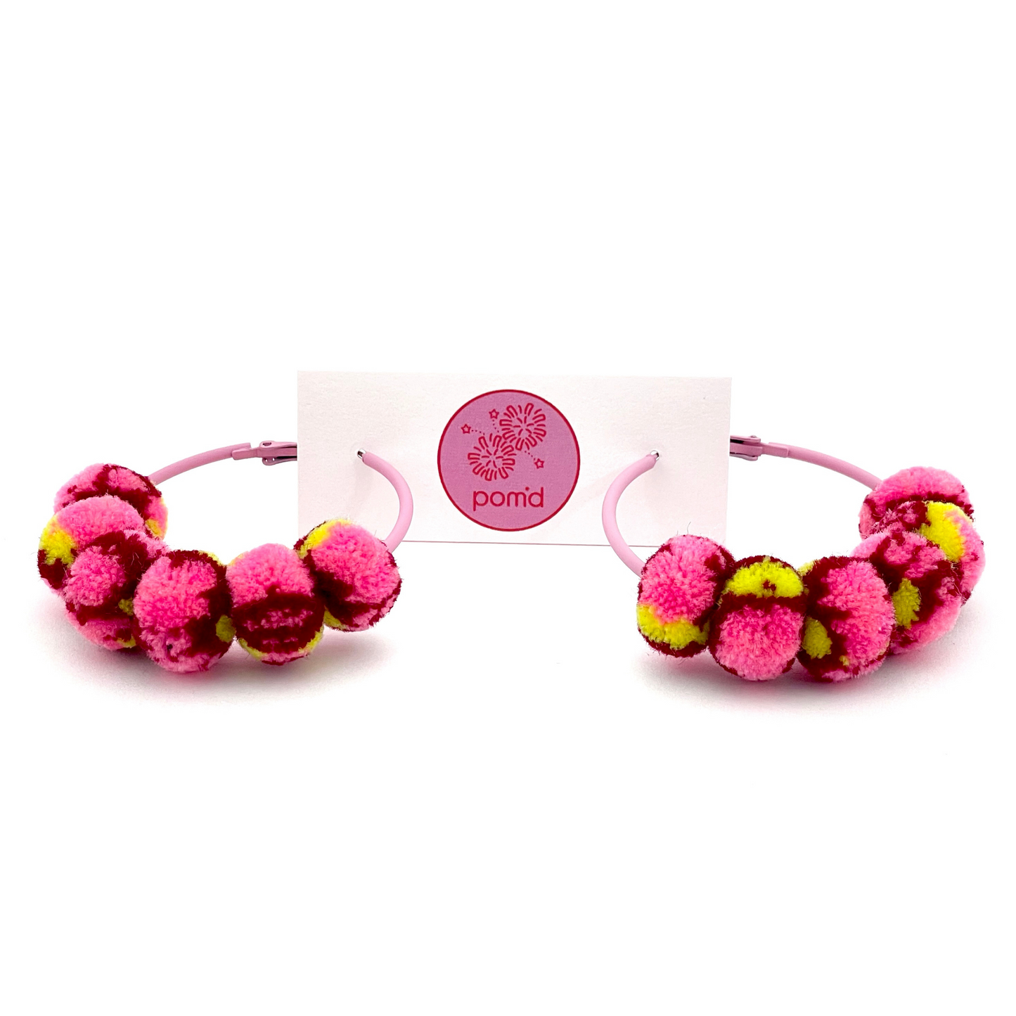 pom'd painted hoops in pink lemonade
